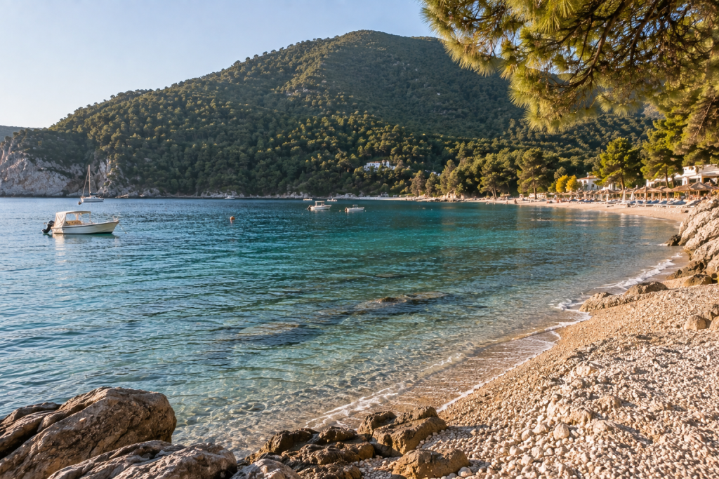 Panormos Beach and pine-covered hills on Skopelos near Panormos Beach Hotel
