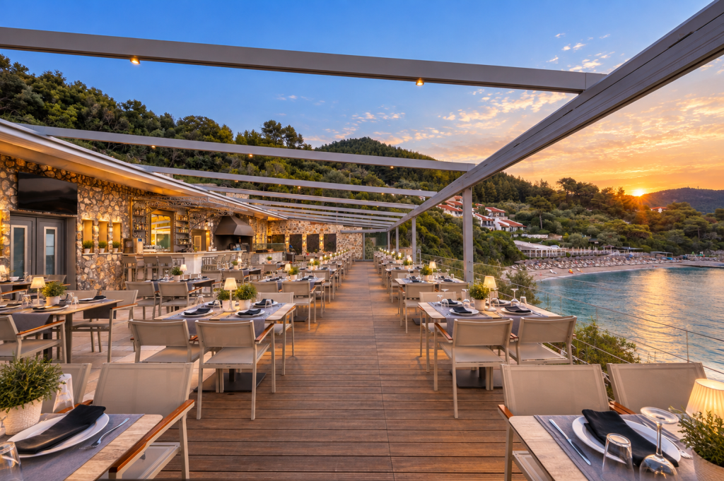 Beachfront restaurant at Adrina Beach Hotel serving Greek food beside the sea.